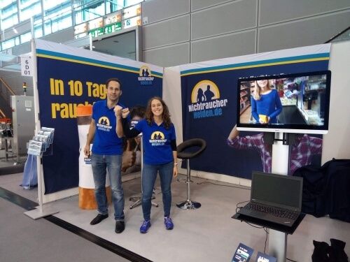 Janine und Andy am Messestand